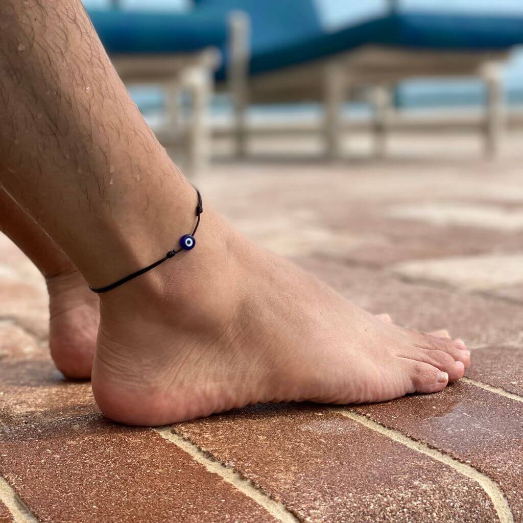 Adjustable evil eye anklet with durable cord and protective lucky eye charm, suitable for women, men, and teens. Perfect for beach and outdoor activities - Luck Strings