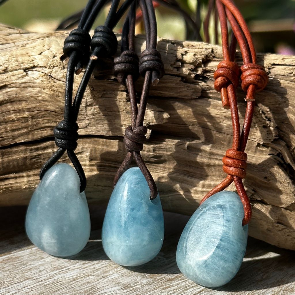 Luck Strings-Trio of aquamarine stones handcrafted on a leather cord with adjustable sliding knots