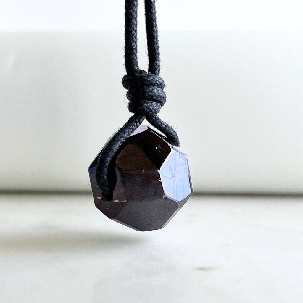 Garnet Geometrical Hexagon Pendant - A symbol of love, strength, and elegance by Luck Strings.