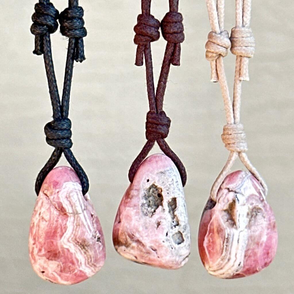 Luck Strings elegant Rhodochrosite pendants with adjustable wax cotton cords.