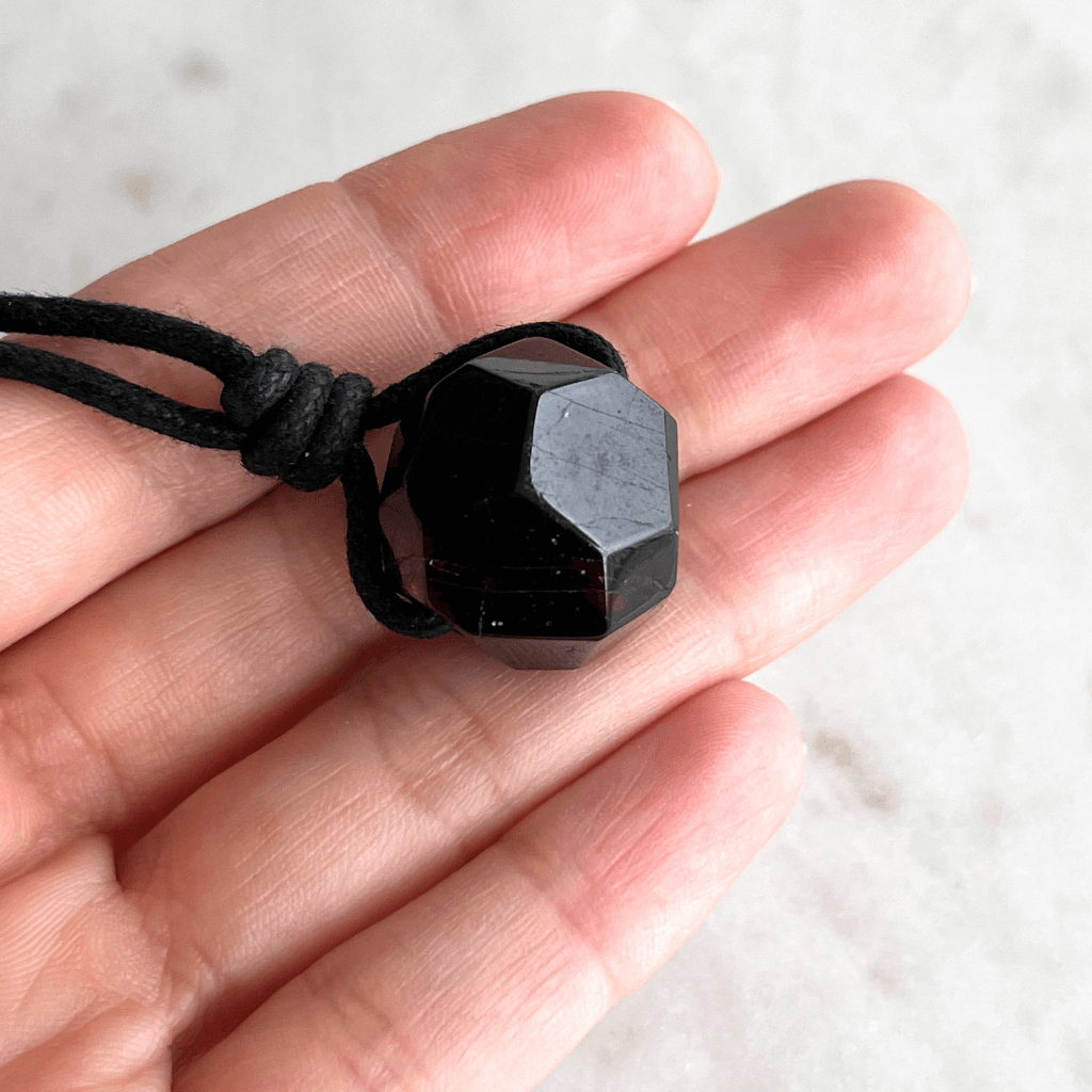 Garnet Geometrical Hexagon Pendant - A symbol of love, strength, and elegance by Luck Strings.