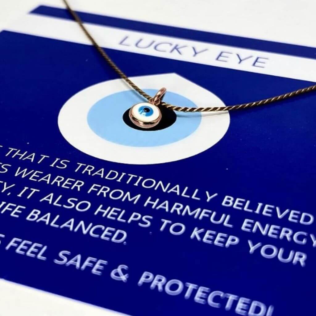 Close-up of the Gold Turkish Evil Eye Choker with a 5mm glass charm, showcasing the delicate craftsmanship and elegant design - Luck Strings.