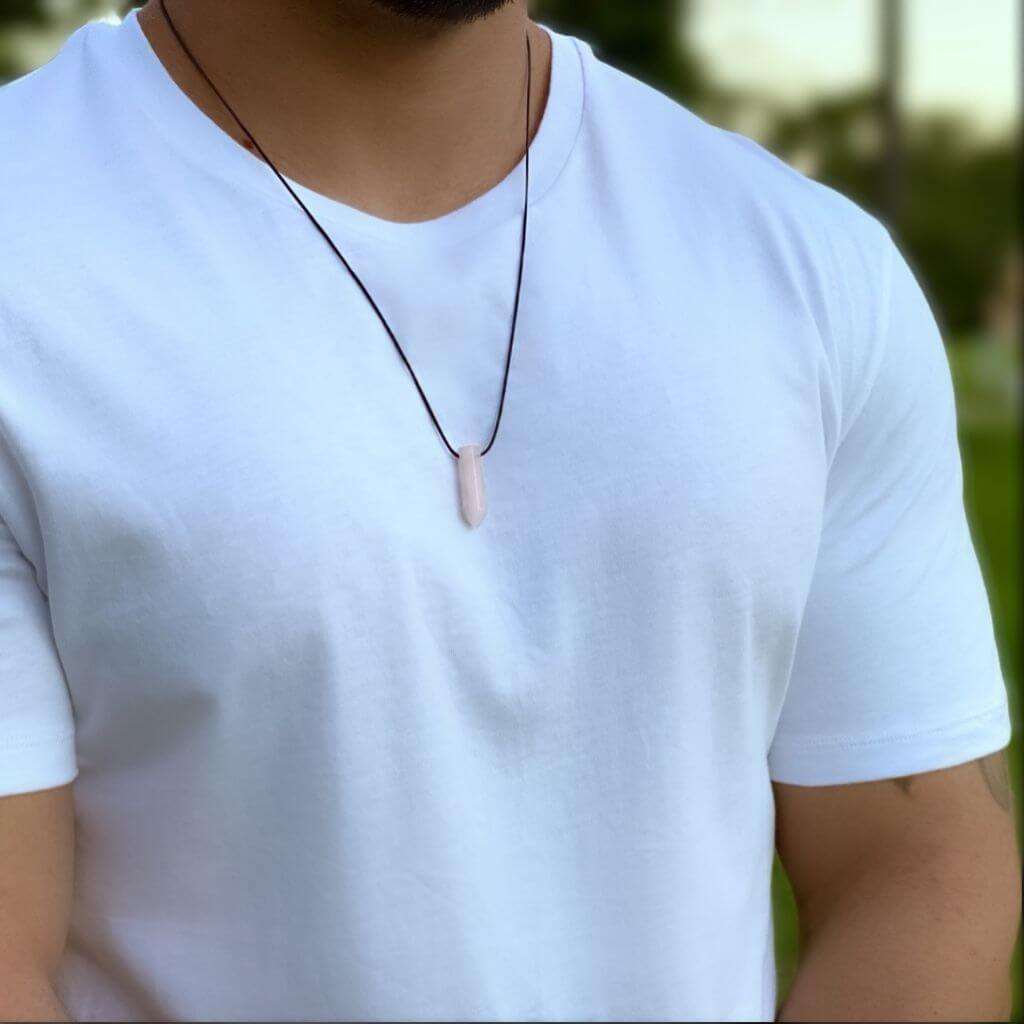 Man stylishly adorned with a Bullet Point Gemstone Necklace, reflecting his personal style and choice of gemstone - Luck Strings