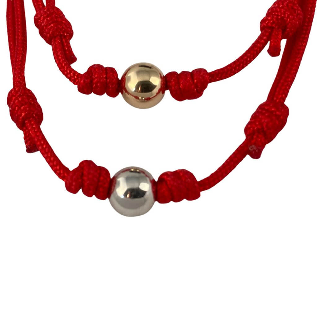 Red and black string bracelets with 14K gold beads, showcasing both color options - Luck Strings