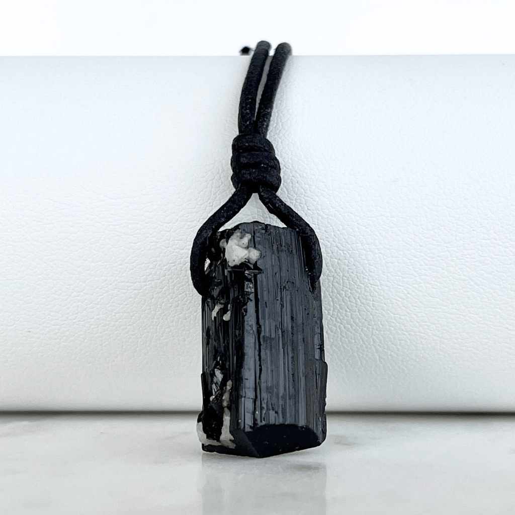 Raw Black Tourmaline Crystal Necklace - A symbol of grounding and transformation by Luck Strings.