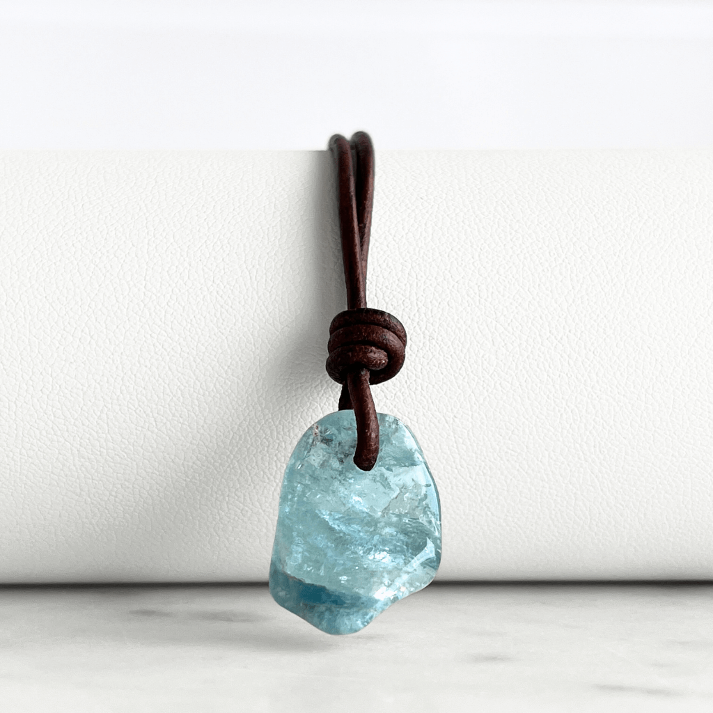 Inner Serenity: A pendant necklace featuring a natural small aquamarine gemstone, symbolizing inner calm and tranquility.