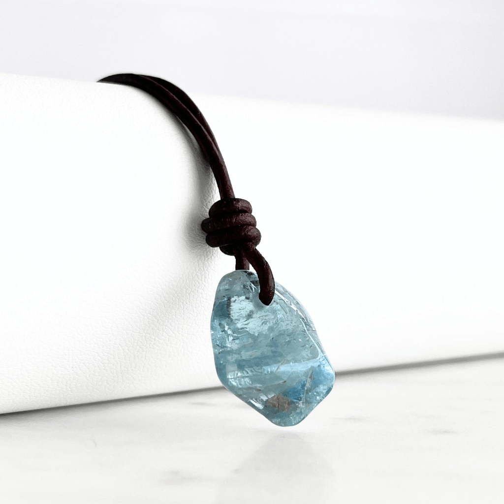 Inner Serenity: A pendant necklace featuring a natural small aquamarine gemstone, symbolizing inner calm and tranquility.