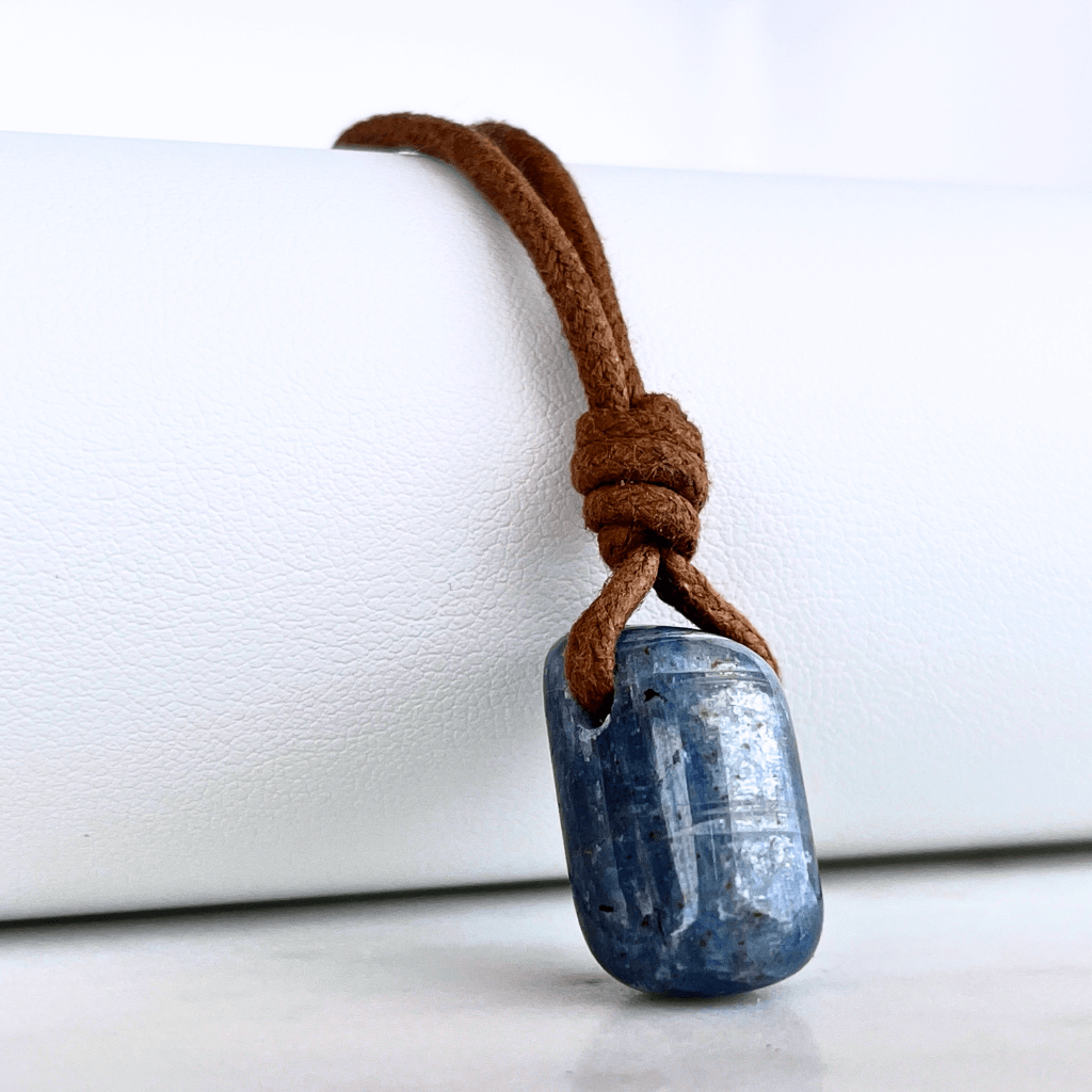 A beautiful OOAK Kyanite gemstone pendant featuring captivating blue shades, radiating beauty and uniqueness.