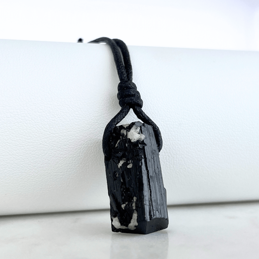 Raw Black Tourmaline Crystal Necklace - A symbol of grounding and transformation by Luck Strings.