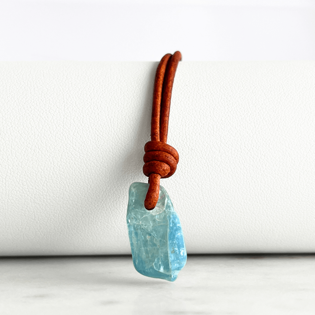 Oceanic Bliss: This pendant necklace showcases a natural small aquamarine gemstone, capturing the essence of tranquil oceanic serenity.