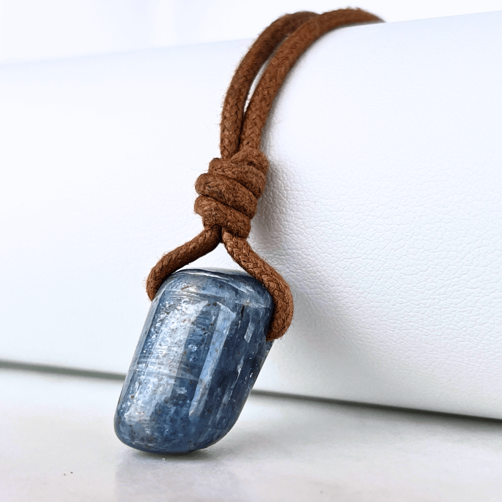 A beautiful OOAK Kyanite gemstone pendant featuring captivating blue shades, radiating beauty and uniqueness.