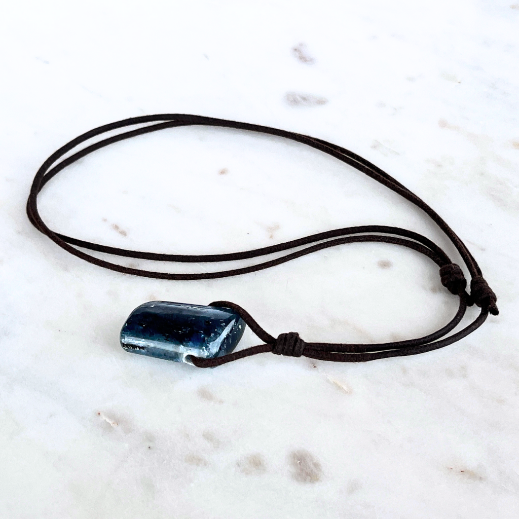 A stunning Kyanite pendant with captivating blue hues, exuding elegance and sophistication.