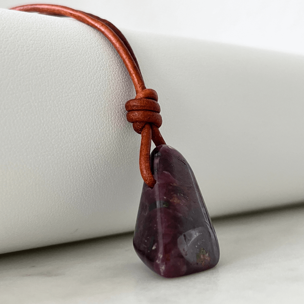 Exclusive One-of-a-Kind Natural Ruby Gemstone Pendant displaying its rich red color and unique beauty, symbolizing passion and elegance - Luck Strings.