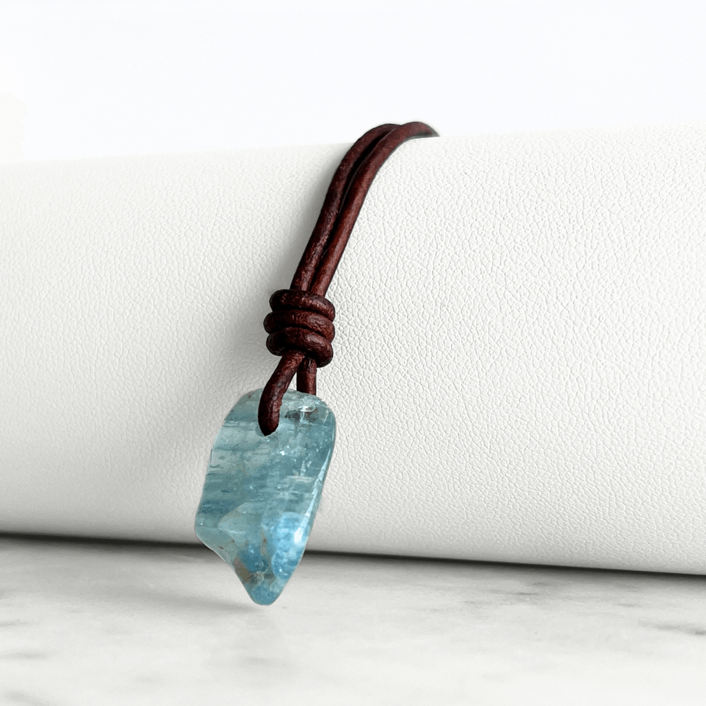 Inner Serenity: A pendant necklace featuring a natural small aquamarine gemstone, symbolizing inner calm and tranquility.