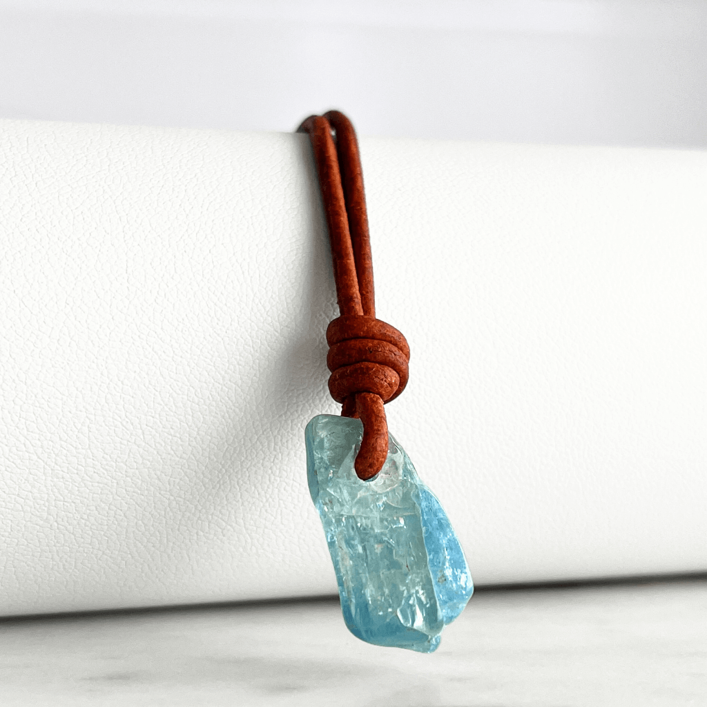 Oceanic Bliss: This pendant necklace showcases a natural small aquamarine gemstone, capturing the essence of tranquil oceanic serenity.