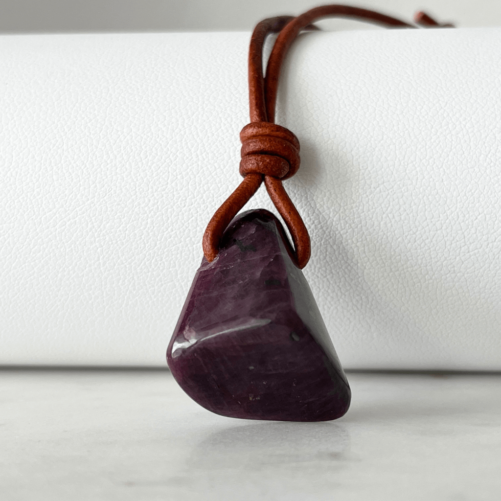 Exclusive One-of-a-Kind Natural Ruby Gemstone Pendant displaying its rich red color and unique beauty, symbolizing passion and elegance - Luck Strings.