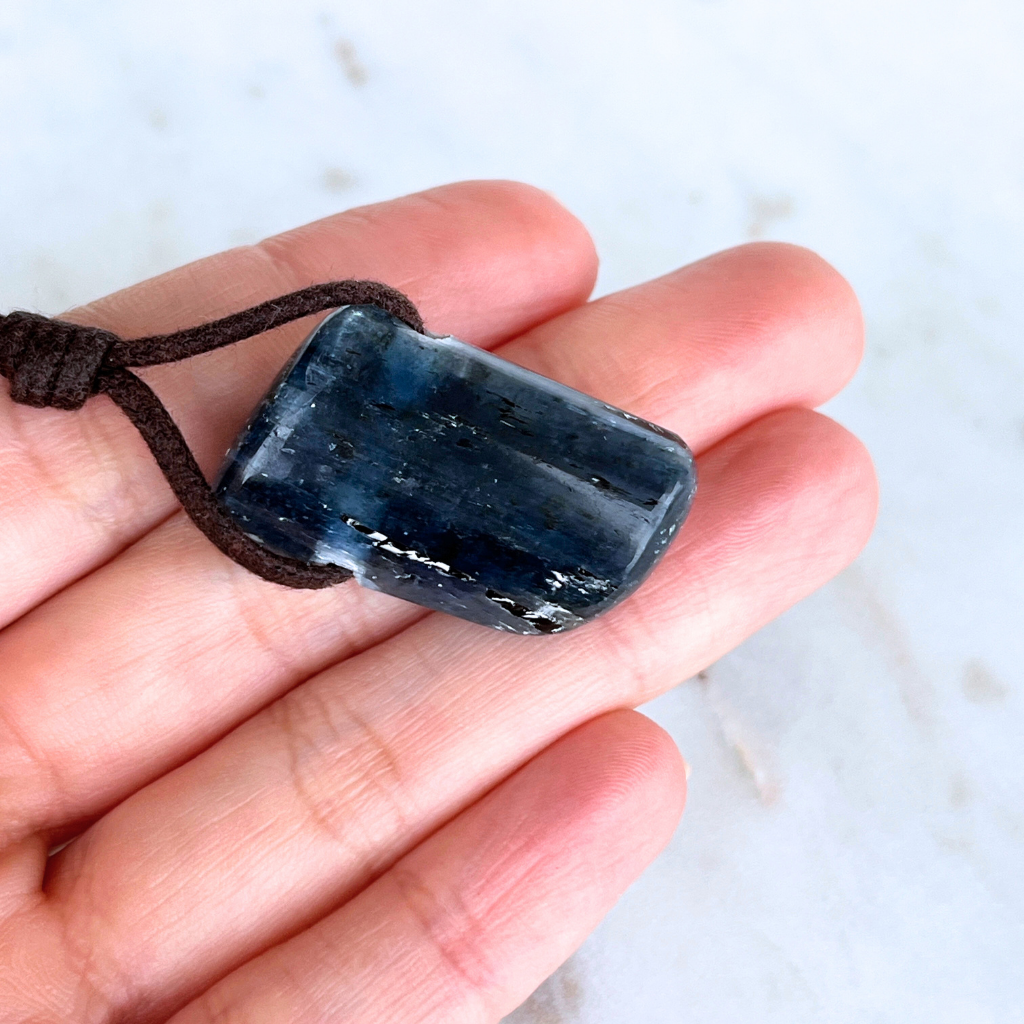 A stunning Kyanite pendant with captivating blue hues, exuding elegance and sophistication.