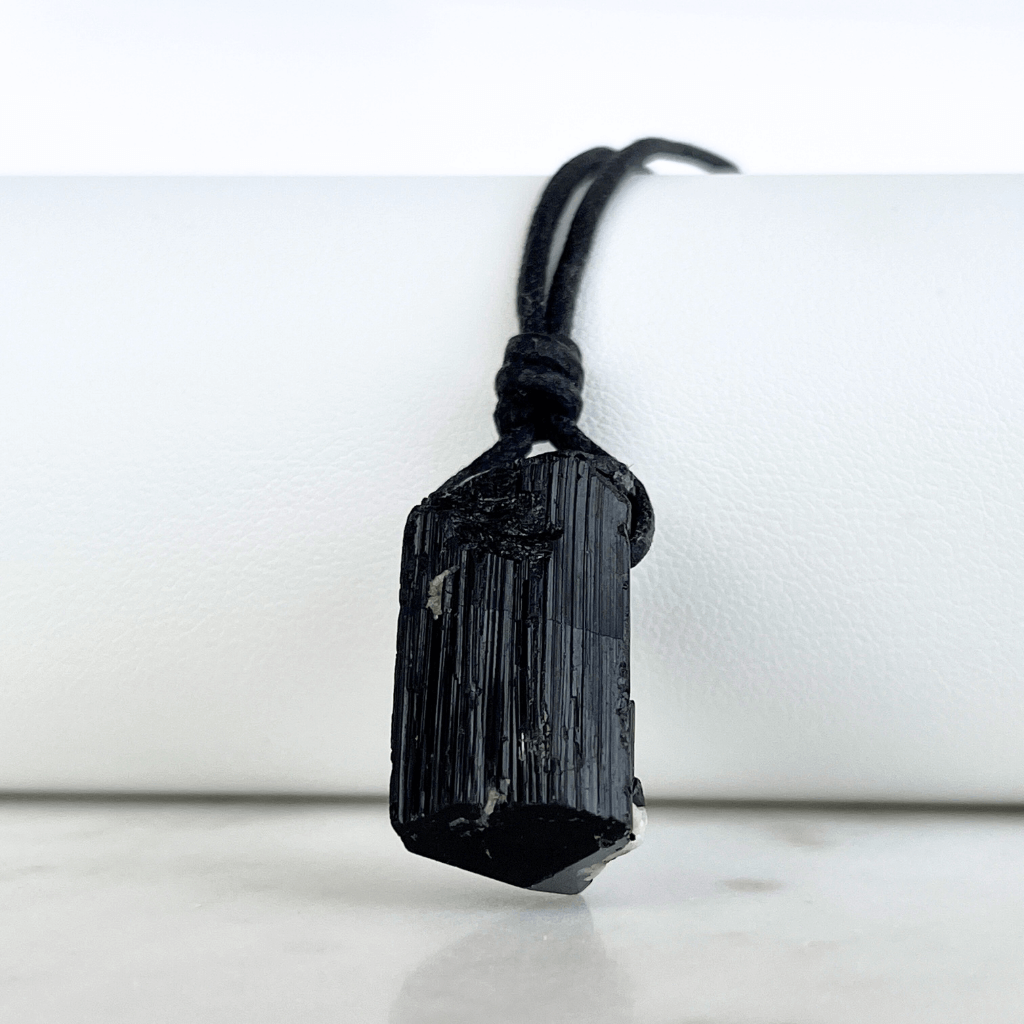 Raw Black Tourmaline Crystal Necklace - A symbol of grounding and transformation by Luck Strings.