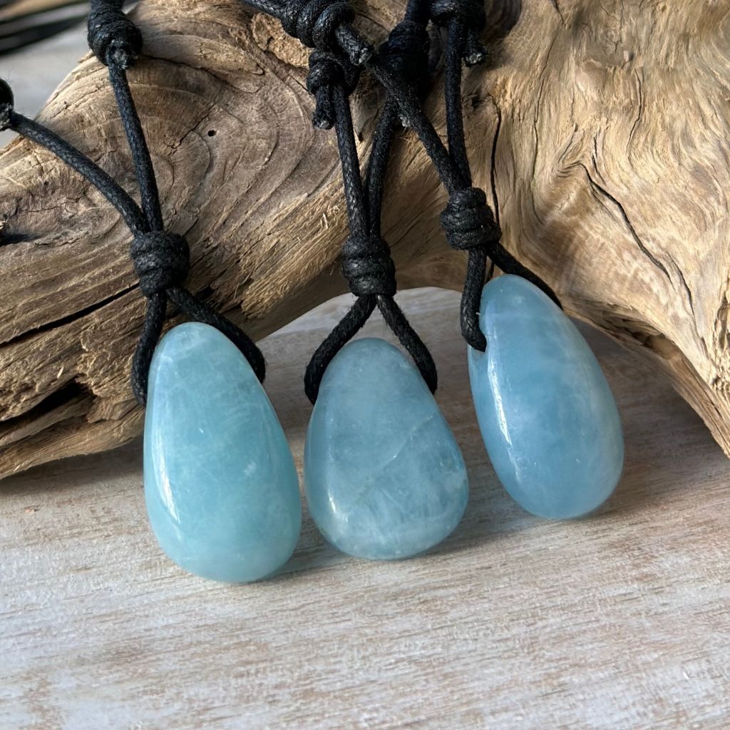 Luck Strings-Trio of aquamarine stones handcrafted on a waxed nylon cord with adjustable sliding knots