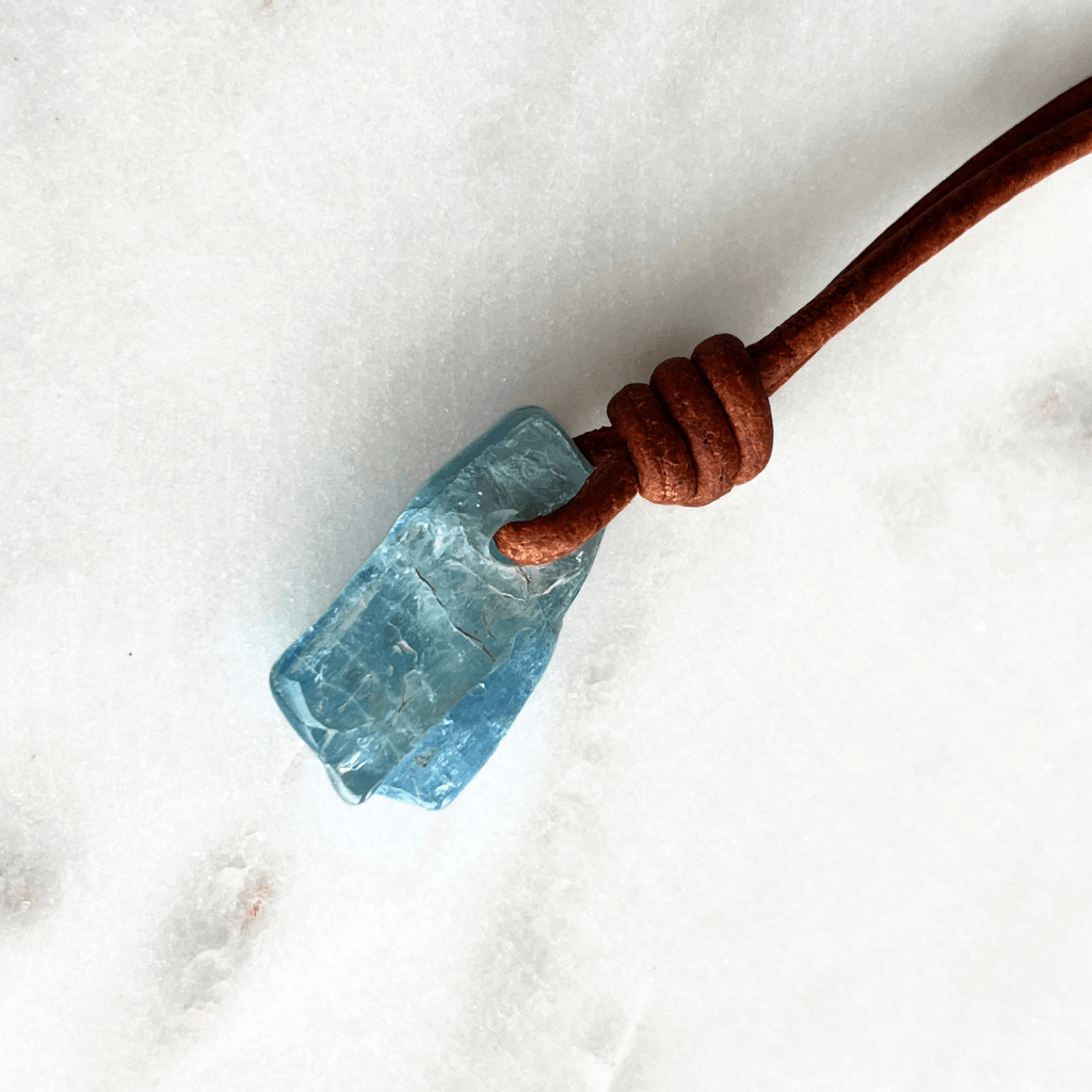 Oceanic Bliss: This pendant necklace showcases a natural small aquamarine gemstone, capturing the essence of tranquil oceanic serenity.