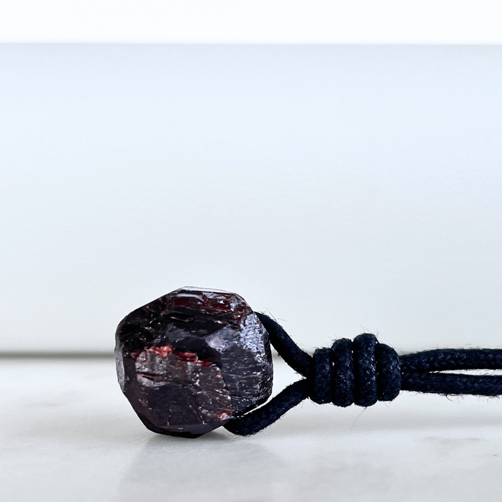 Round Raw Garnet OOAK Gemstone Pendant - A symbol of love and vitality by Luck Strings.