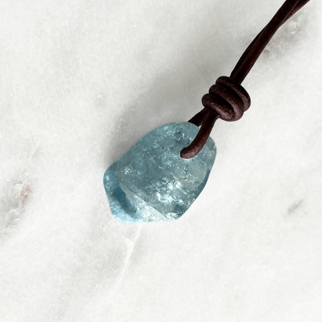 Inner Serenity: A pendant necklace featuring a natural small aquamarine gemstone, symbolizing inner calm and tranquility.