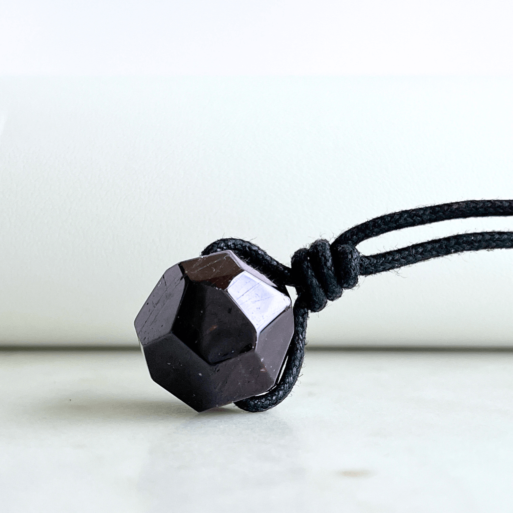 Garnet Geometrical Hexagon Pendant - A symbol of love, strength, and elegance by Luck Strings.