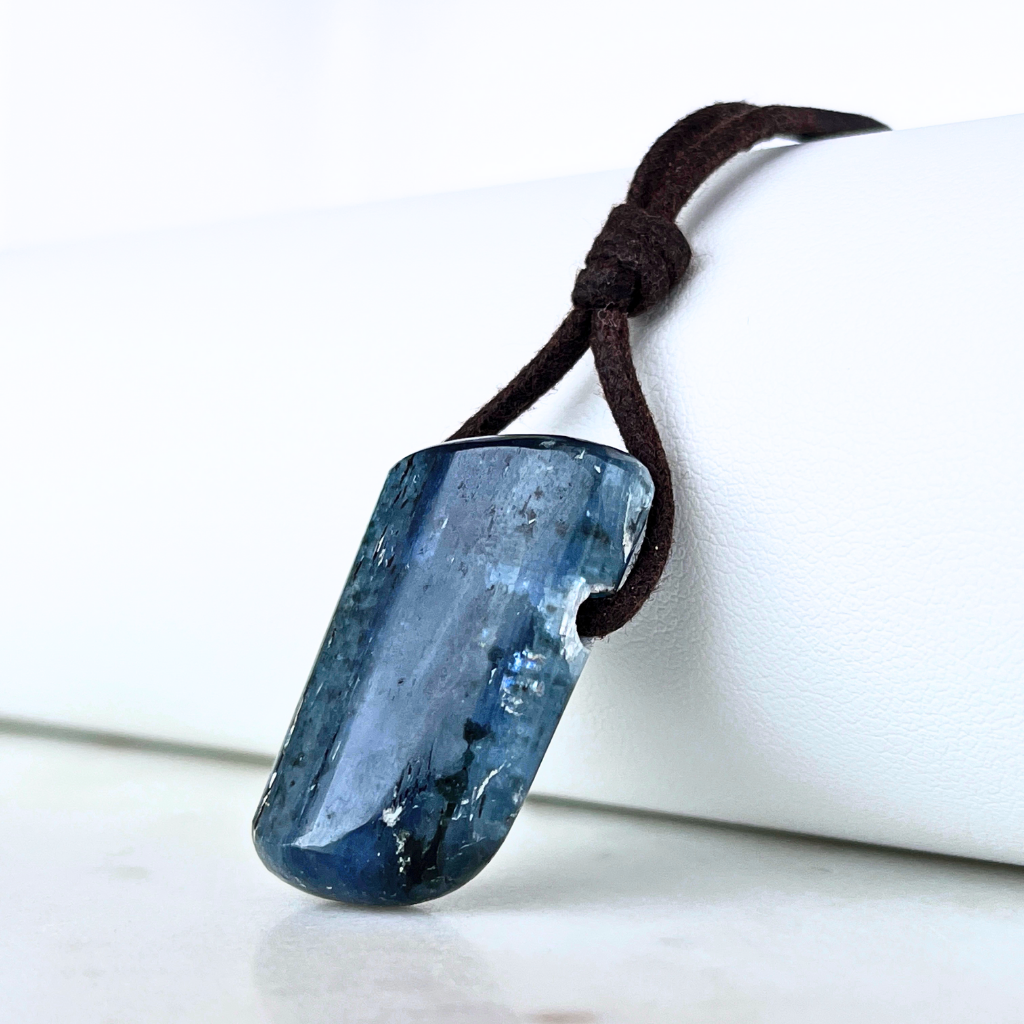 A stunning Kyanite pendant with captivating blue hues, exuding elegance and sophistication.