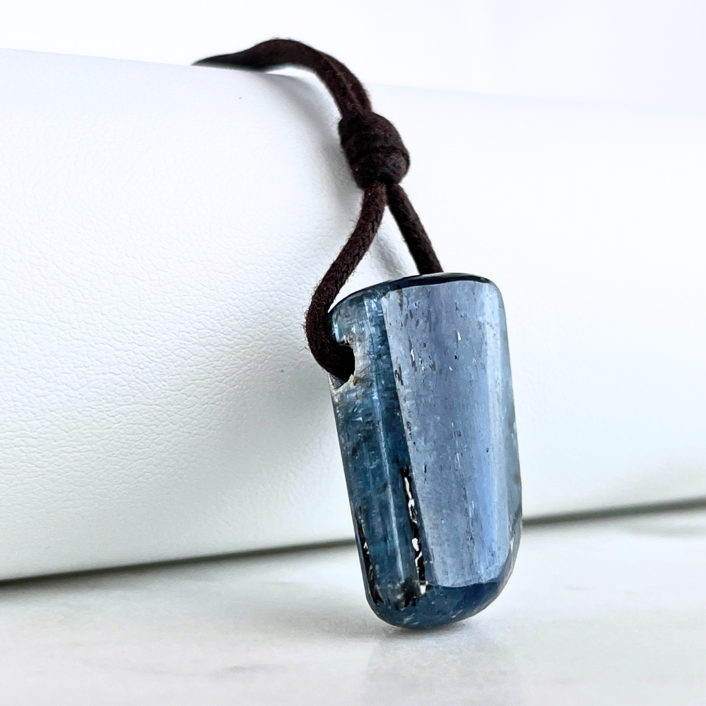 A stunning Kyanite pendant with captivating blue hues, exuding elegance and sophistication.