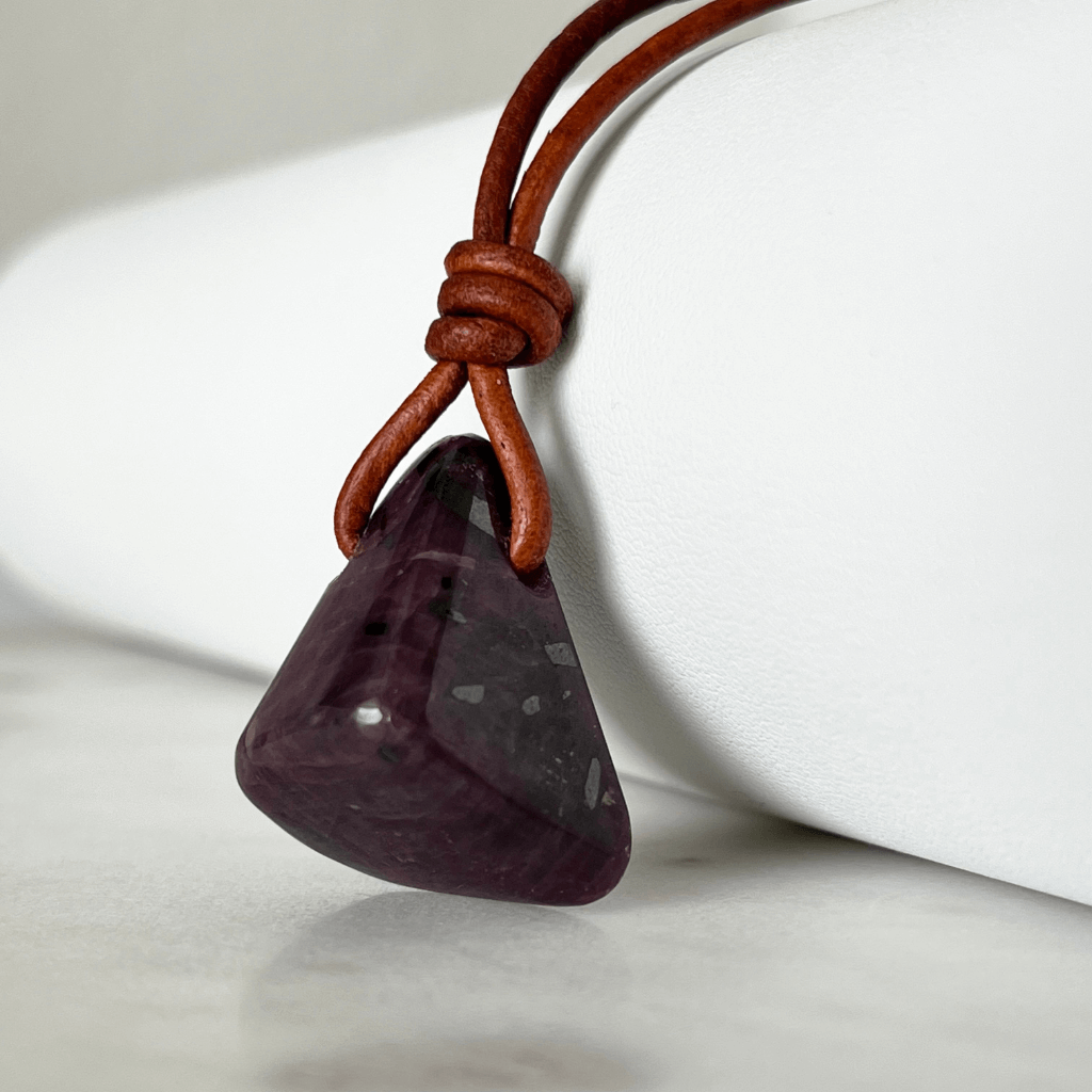 Exclusive One-of-a-Kind Natural Ruby Gemstone Pendant displaying its rich red color and unique beauty, symbolizing passion and elegance - Luck Strings.