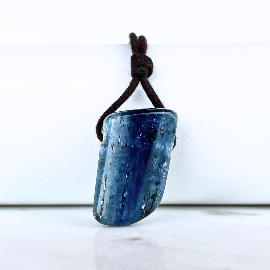 A stunning Kyanite pendant with captivating blue hues, exuding elegance and sophistication.