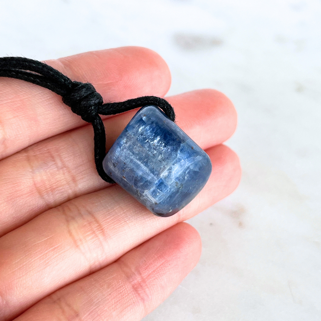 A one-of-a-kind Natural Kyanite pendant showcasing its unique beauty and elegance.