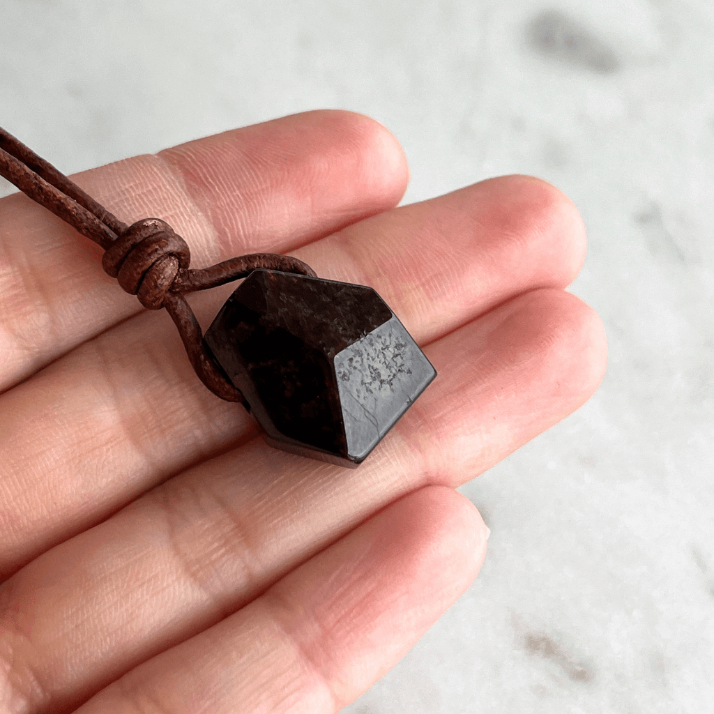 Geometric Garnet Hexagon Pendant - A symbol of love, strength, and elegance by Luck Strings.