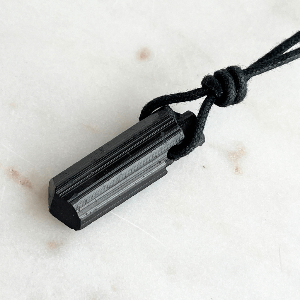 Raw Black Tourmaline OOAK Point Pendant Necklace - A symbol of grounding and resilience by Luck Strings.