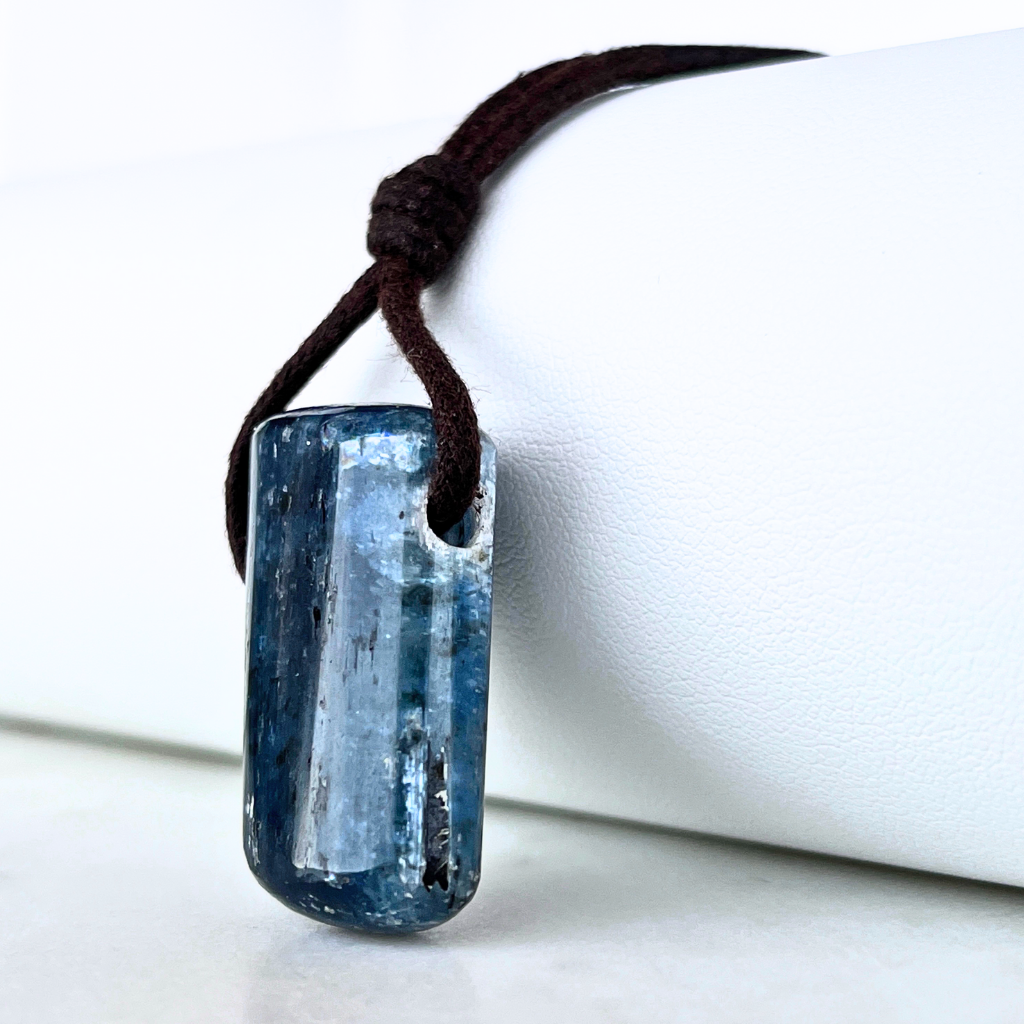 A stunning Kyanite pendant with captivating blue hues, exuding elegance and sophistication.