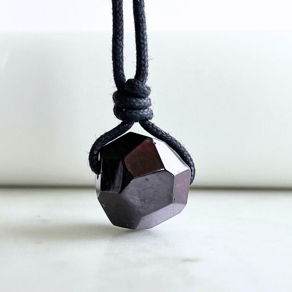 Garnet Geometrical Hexagon Pendant - A symbol of love, strength, and elegance by Luck Strings.