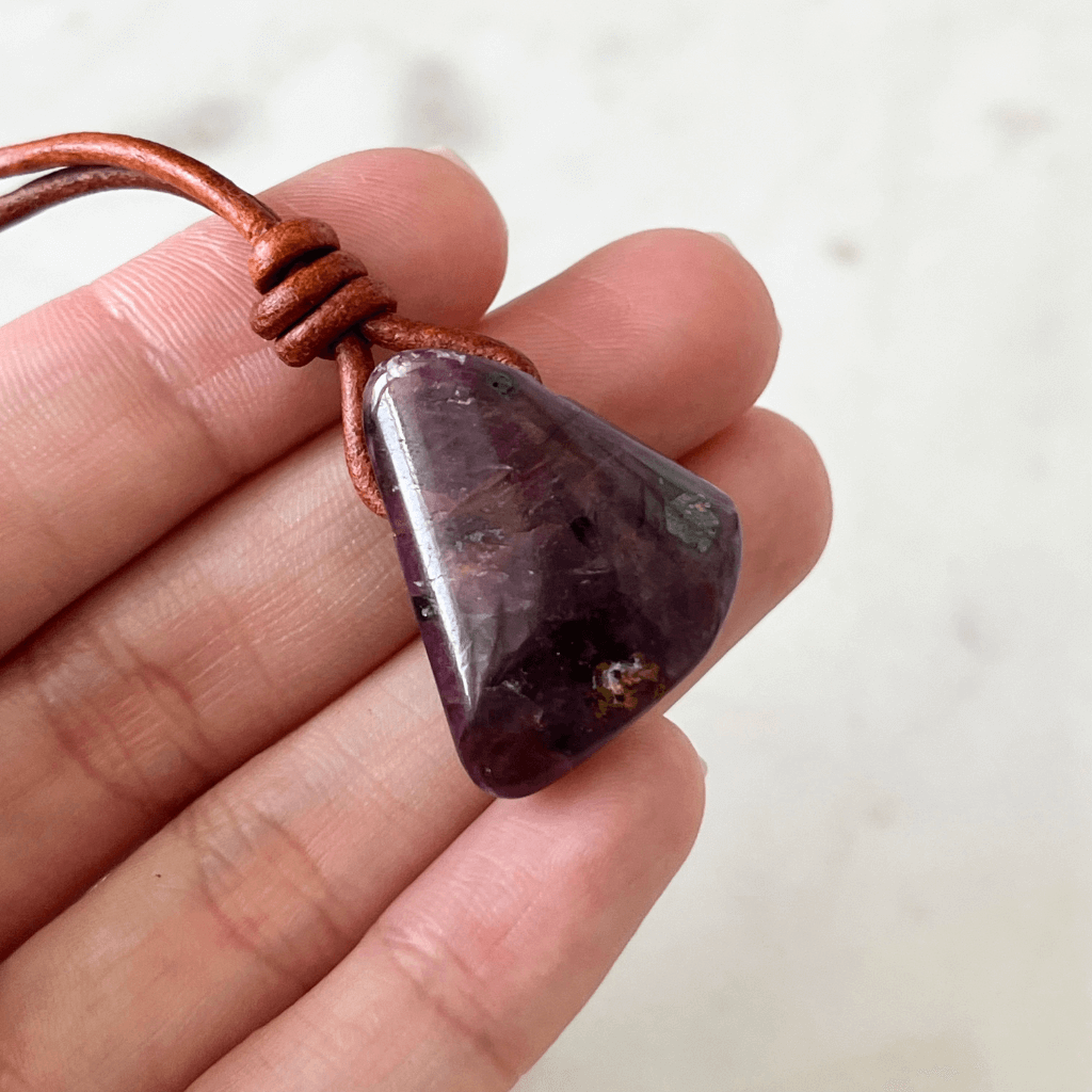 Exclusive One-of-a-Kind Natural Ruby Gemstone Pendant displaying its rich red color and unique beauty, symbolizing passion and elegance - Luck Strings.