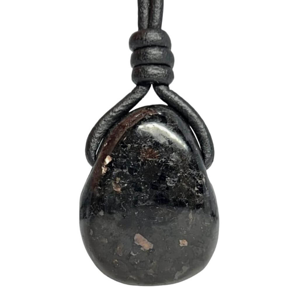 Nuummite gemstone pendant on a black leather cord by Luck Strings, highlighting the sleek design suitable for any style.