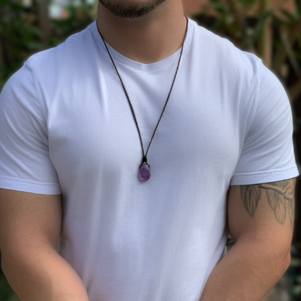 Man wearing a Luck Strings Amethyst pendant necklace